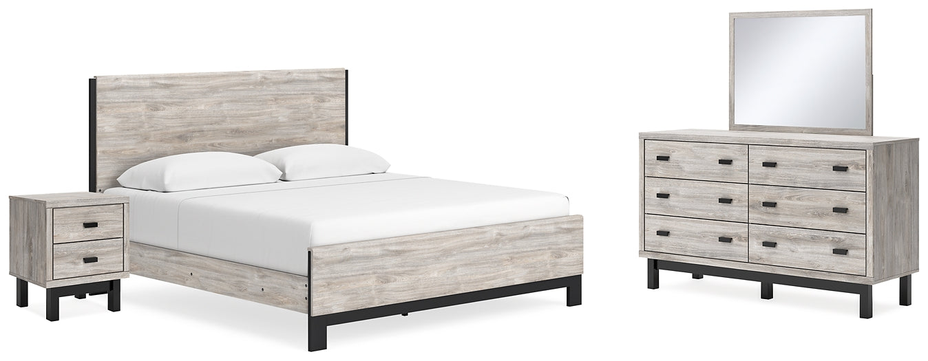 Vessalli King Panel Bed with Mirrored Dresser and Nightstand